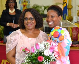 Dr. Angela Smith Prinicpal of Gorden Greenidge School 40 year celebration receiving gifts