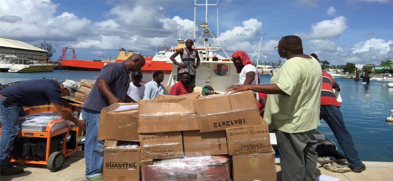 United Caribbean Trust partnering with The Living Room shipping Sawyer PointOne Water Filtration Systems in Dominica following hurricane Maria