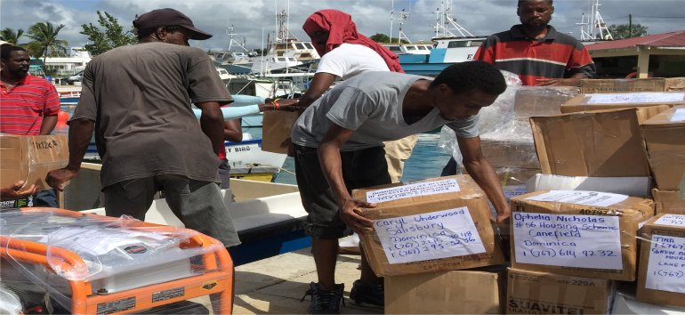 United Caribbean Trust partnering with The Living Room shipping Sawyer PointOne Water Filtration Systems in Dominica following hurricane Maria