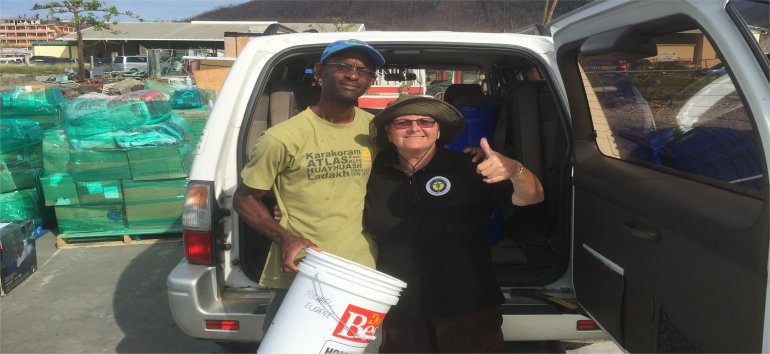 Jenny Tryhane founder of United Caribbean Trust partnering with The Living Room distributing Sawyer PointOne Water Filtration Systems in Dominica following hurricane Maria