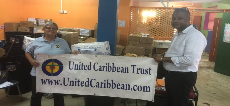 Jenny Tryhane founder of United Caribbean Trust partnering with The Living Room distributing Sawyer PointOne Water Filtration Systems in Dominica following hurricane Maria